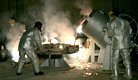Iran-Technicians work inside Iranian uranium conversion facility.jpg