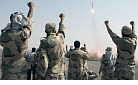 Iran's Revolutionary Guard celebrates after launching missile.jpg
