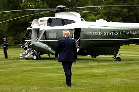 Trump onto helicopter