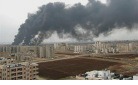 Syria-black smoke from Homs refinery.jpg