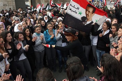 Syrian_women_demonstrating_against_Bashar_al-Assad.jpg