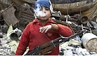 Syrian 7-yr old w/rifle.jpg