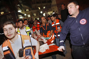Medics_evacuate_a_wounded_Israeli_from_Jerusalem_shooting.jpg