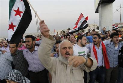 Syrian_men_in_Jordan_demonstrating_agst_Syrian_Pres_Bashar_al-Assad #2.jpg