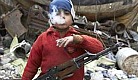 Syrian 7-yr old w/rifle.jpg