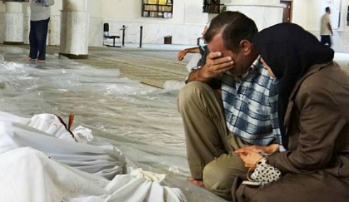 Syrian families mourn.jpg