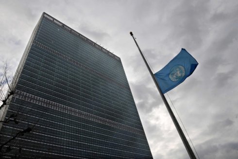 UN_flag_at_half_mast_for_Kim_Jong_Il.jpg