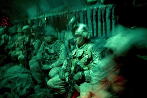 Afghanistan-U.S. soldiers on helicopter prepare for night assault.jpg