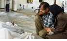 Syrian families mourn.jpg